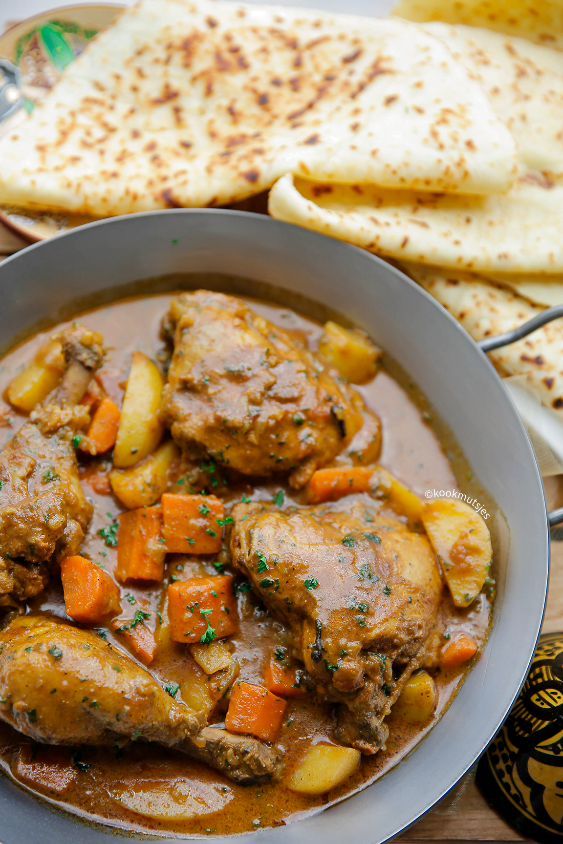 Kip met groenten en kokosmelk eindresultaat