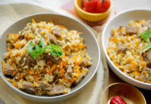 Rijst met kalfsvlees en wortel