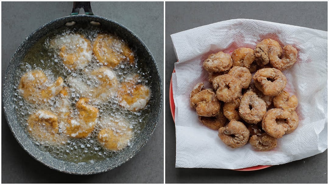 Garnalen krokant bakken in zonnebloemolie en uit laten lekken op een vel keukenpapier