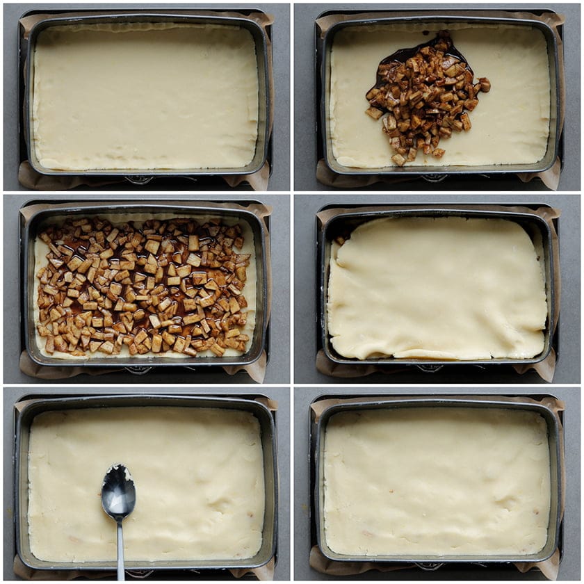 Koekjesdeeg verdelen over een bakvorm met appelstukjes