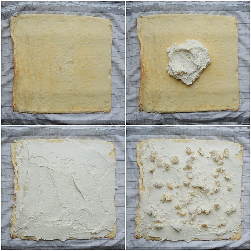 Room uitsmeren over de cake en stukjes raffaello verdelen