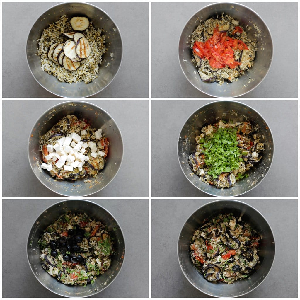 Voeg de aubergine, tomaat, feta kaas, rucola en zwarte olijven toe. Meng tot een geheel.