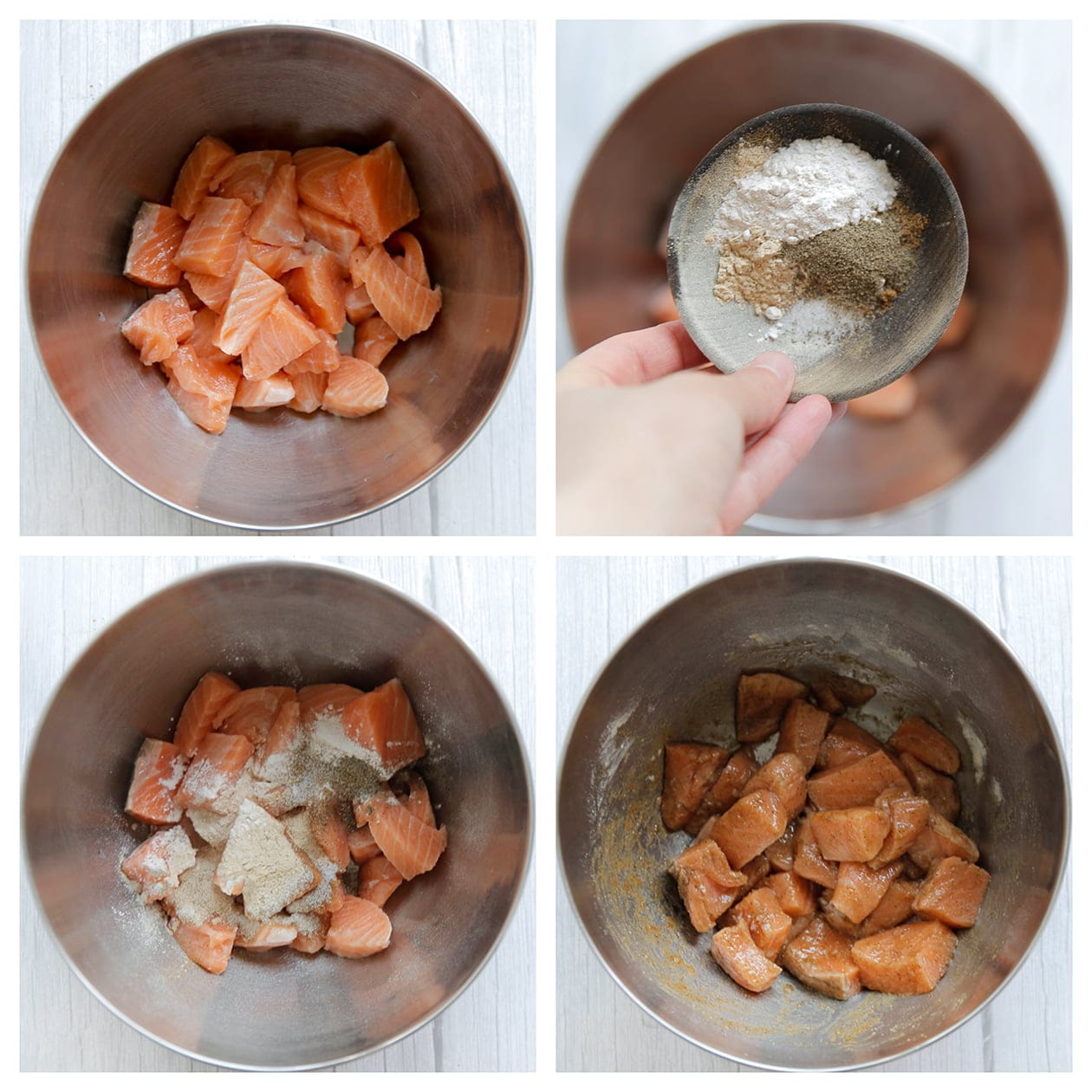 Zalmblokjes mengen met verse kruiden en olijfolie in een diepe kom