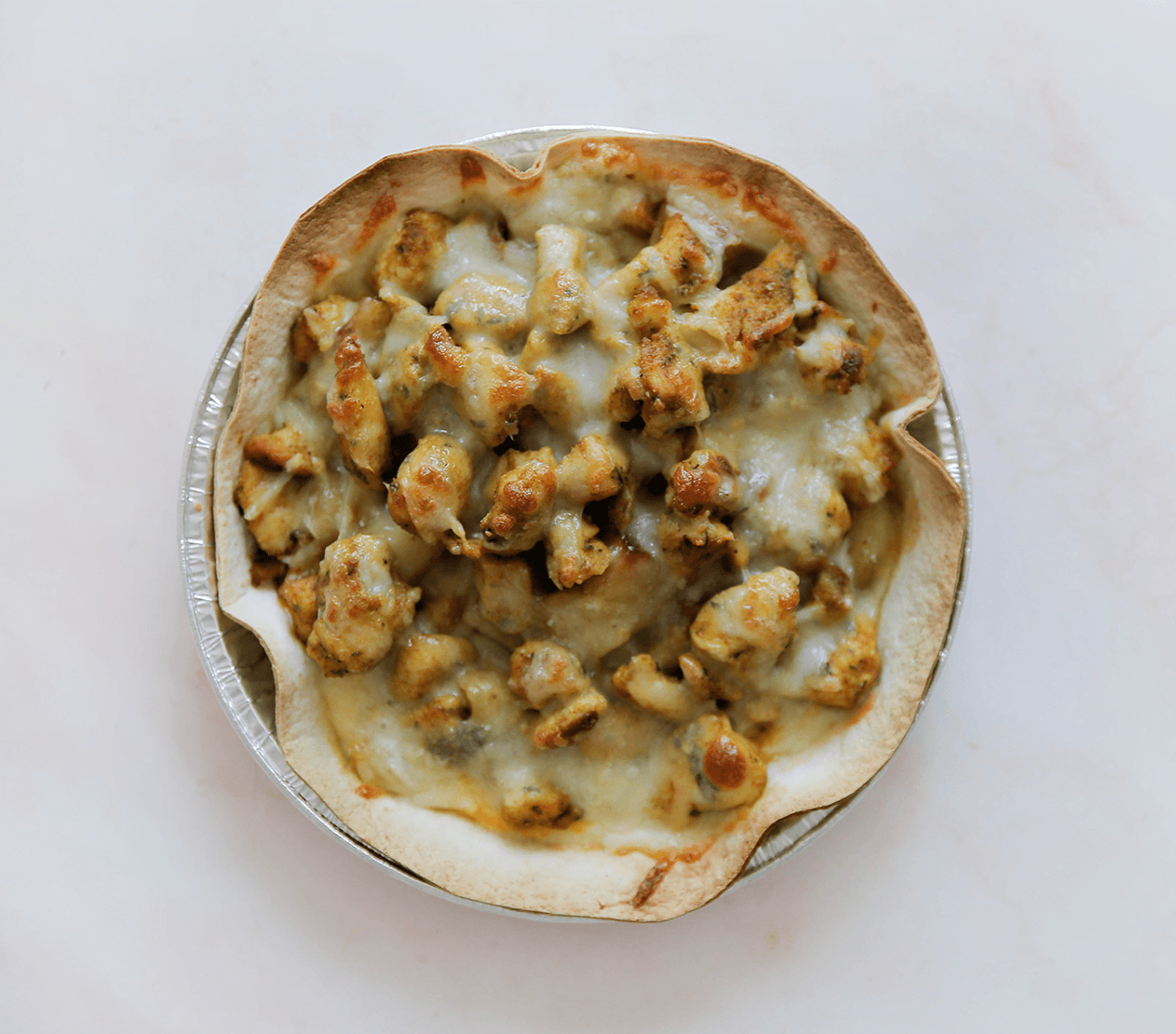 Wrapschotel met kip bakken in de oven