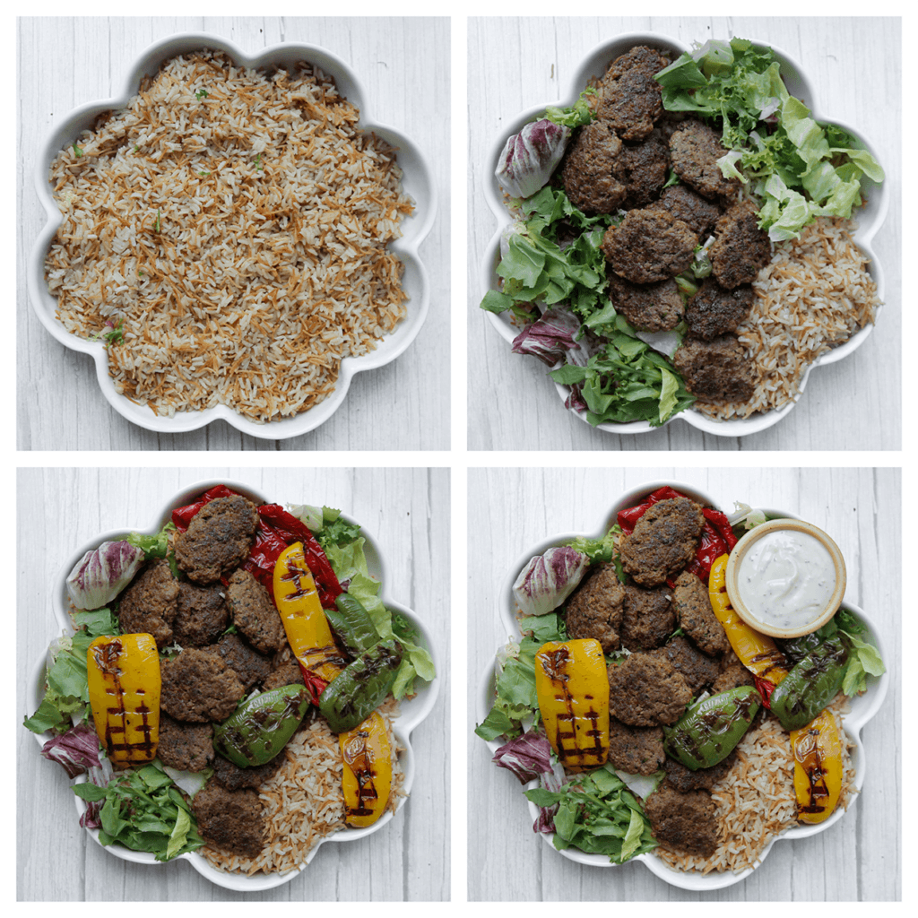 Verdeel de rijst over een schaal en met daarop de sla. Leg het gehakt en de gegrilde paprika’s erop. Serveer met knoflooksaus.