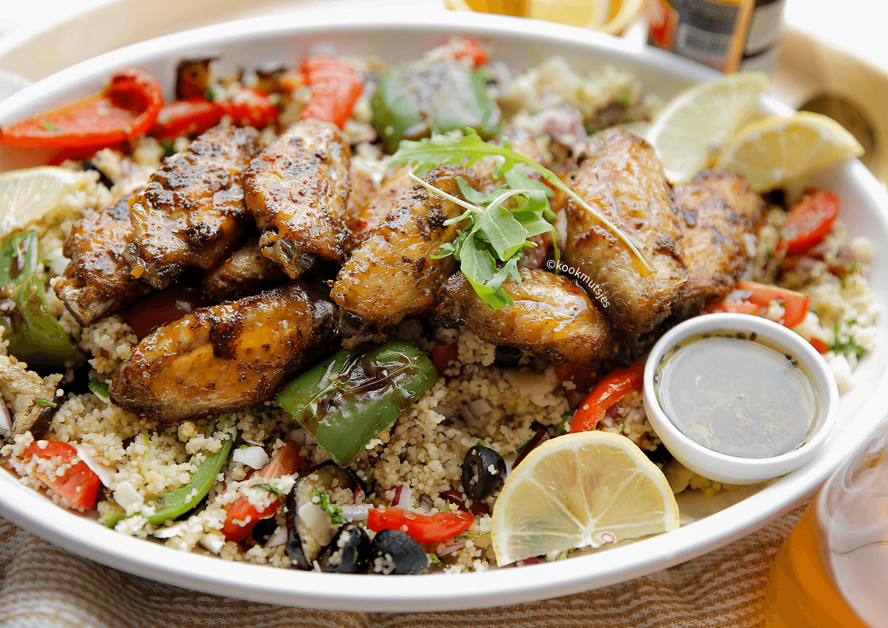 Couscous salade met kippenvleugels