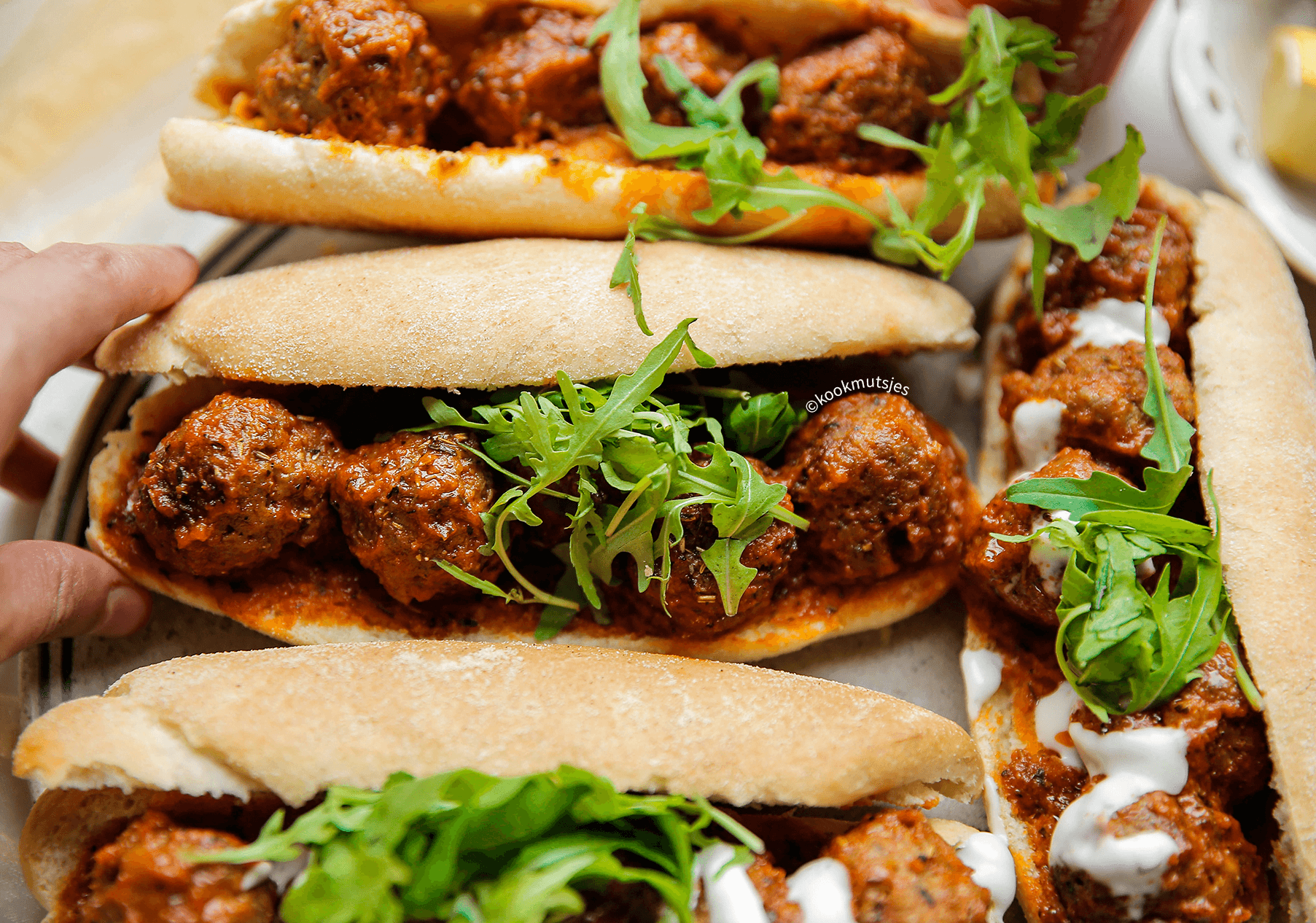 Gehaktballen in tomatensaus Kookmutsjes