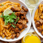 Penne met sticky kippendijen Kookmutsjes