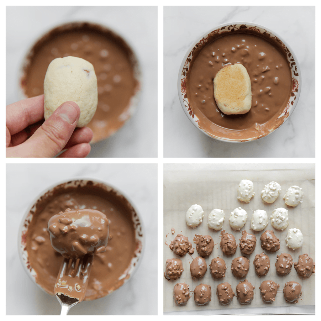 Haal de Snickerskoekjes één voor één door het chocolademengsel. Leg op een vel bakpapier. Laat staan tot de chocolade hard genoeg is.