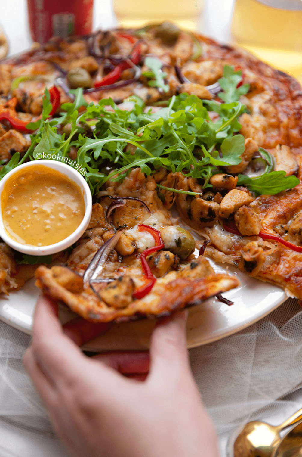 Pizza-wrap met kip puntje pakken eindresultaat