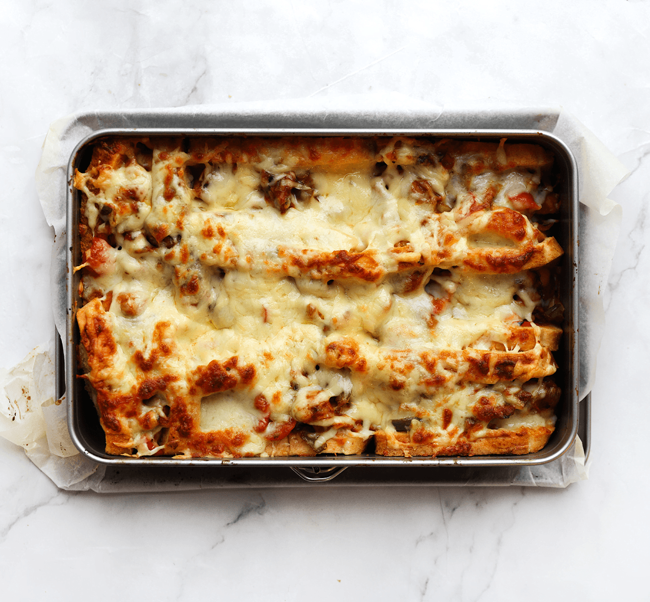 Casinobroodjes met kip bakken in de oven