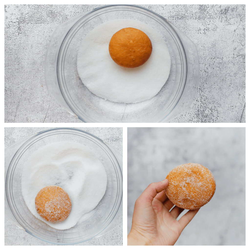 Doe de suiker in een kom. Haal de donuts erdoorheen.