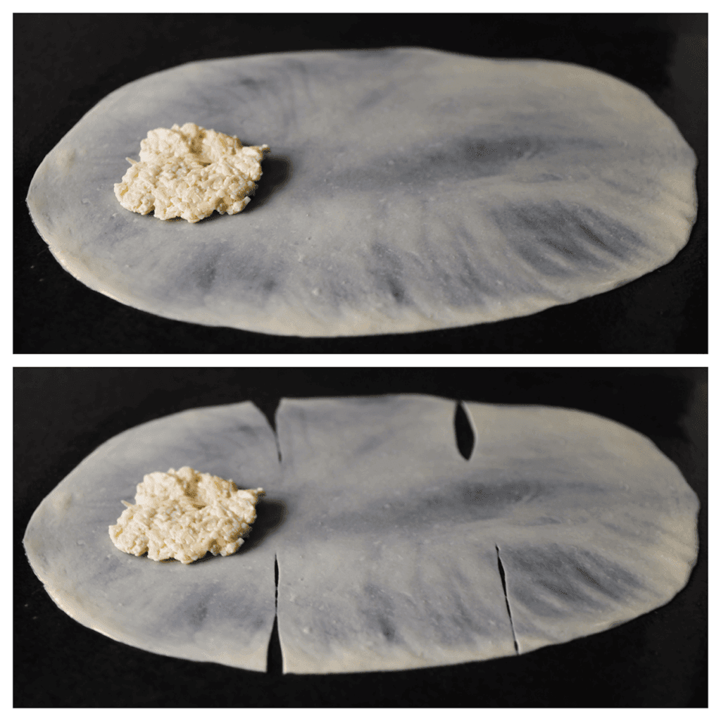 Leg het kaasmengsel op het deeg. Snijd met een pizzasnijder 4 sneetjes in het deeg (dit maakt het vouwen een stuk makkelijker).