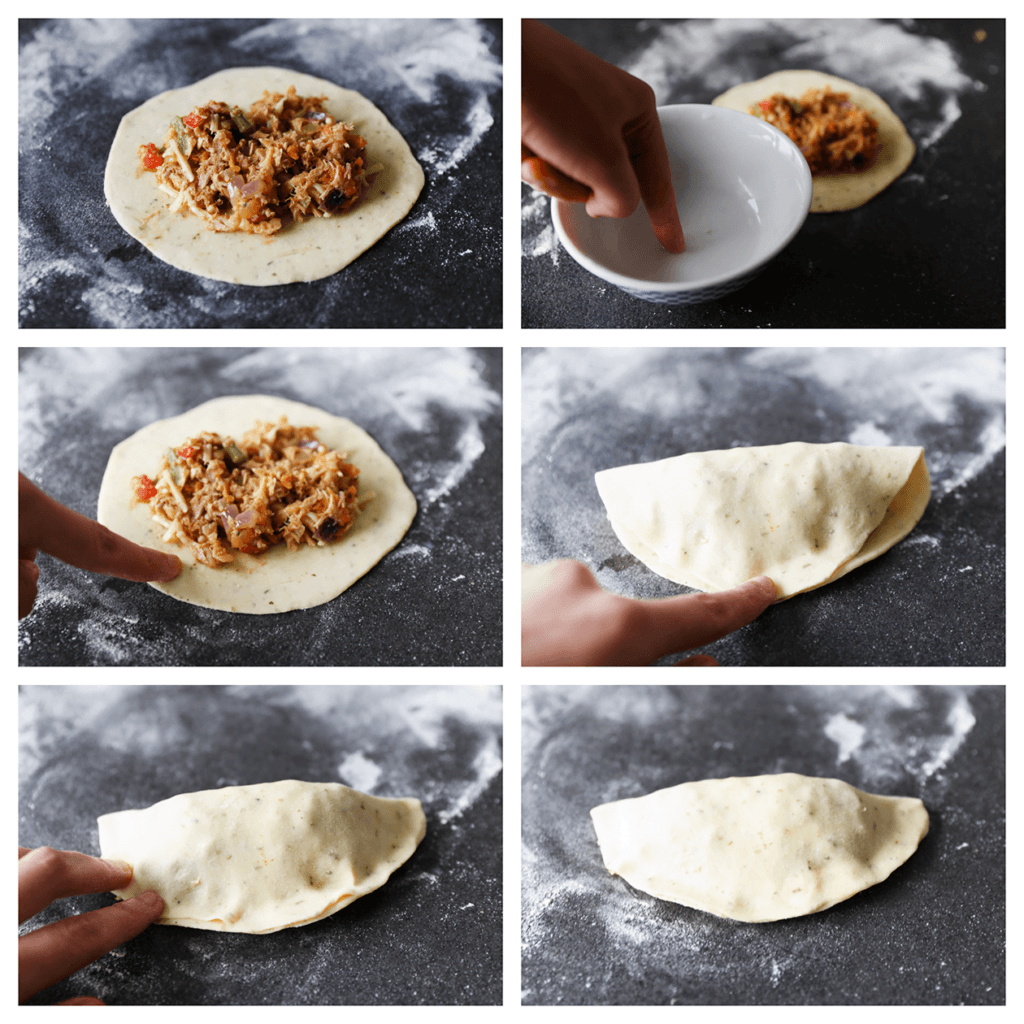 Vul het deeg met het tonijnmengsel (50 gr vulling). Maak de randen van het deeg vochtig met water en vouw deze dicht.