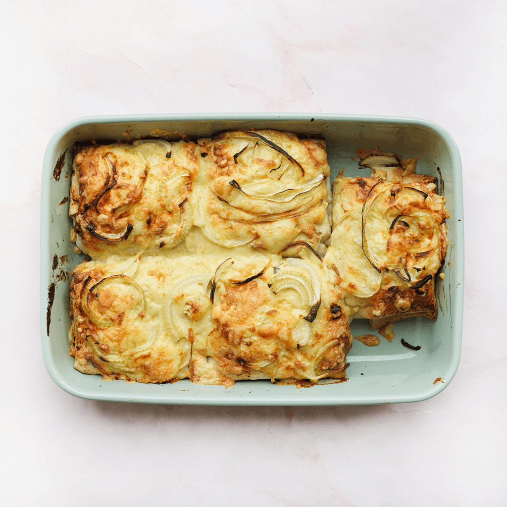 Zet de kippakketjes in een voorverwarmde oven op 200 °C en bak gedurende 10-12 minuten, of totdat de kippakketjes mooi goudbruin zijn gekleurd.