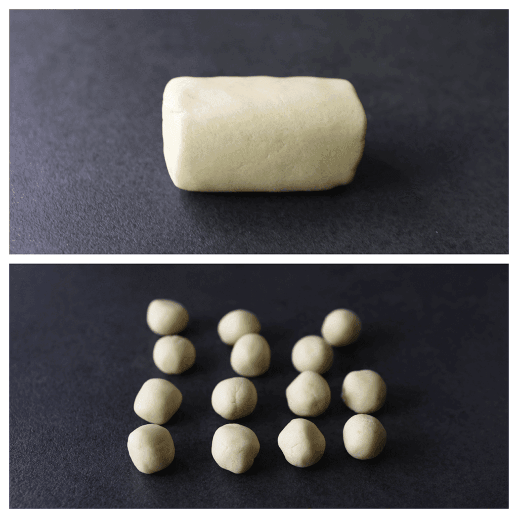 Neem wat van het koekjesdeeg (15 g) en vorm er een bol van. Herhaal deze werkwijze. 