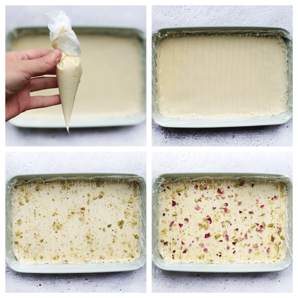 Spuit er lijntjes witte chocolade op. Garneer met stukjes pistachenoten en rozenblaadjes. Leg de pistachekoek, afgedekt, in de koelkast tot de chocolade hard is.