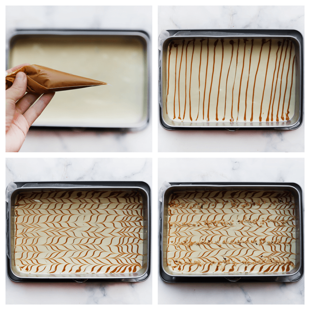 Spuit er meteen wat lijntjes speculoospasta op de chocolade. Gebruik een satéprikker of een tandenstoker om langs de lijntjes witte chocolade te gaan en zo een marmer effect te creëren. Leg de bakvorm, afgedekt, in de koelkast tot de chocolade stevig is.