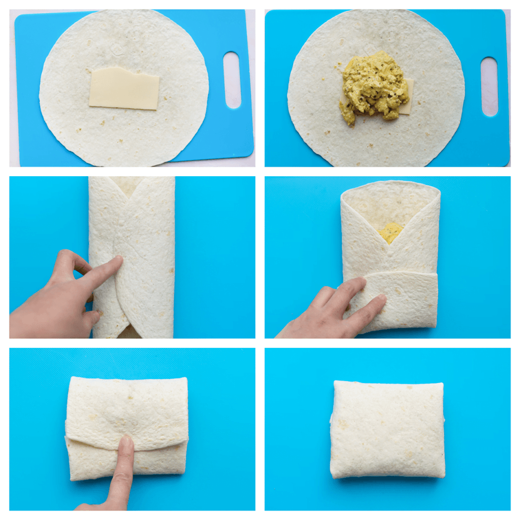 Neem een wrap. Leg er een plakje kaas op, schep het kipmengsel erover en vouw ze dicht tot een pakketje.