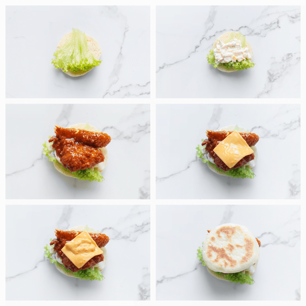 Snijd het broodje horizontaal doormidden. Leg er sla op en verdeel er wat van het groentemengsel op. Leg de kip erop en voeg de cheddar kaas, saus en de bovenkant van het broodje toe.