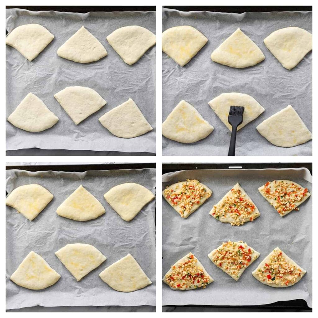 Plaats de driehoekjes deeg op een bakplaat met bakpapier. Bestrijk ze met een geklutst ei en verdeel vervolgens wat van het groente-kaasmengsel erover.