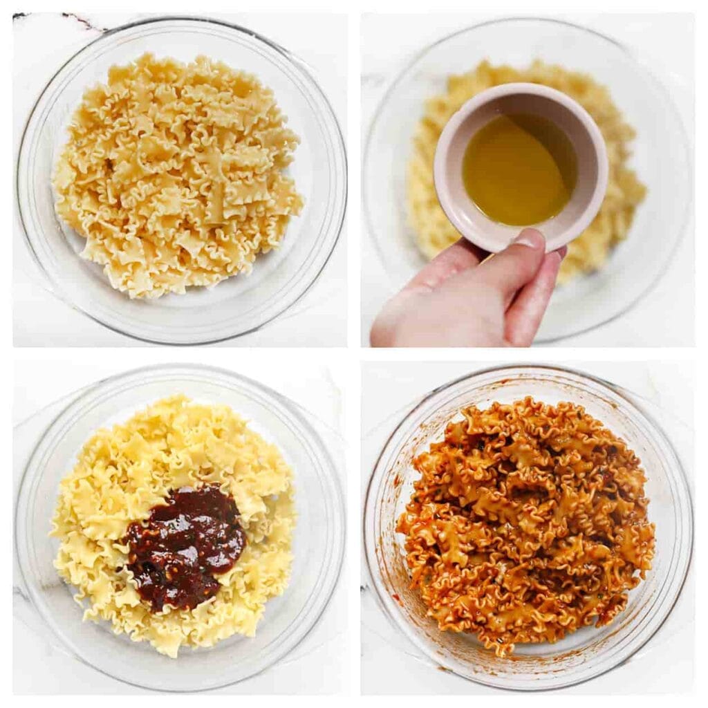 Doe de gekookte pasta in een diepe kom. Voeg de olijfolie en het sausje toe. Meng goed.