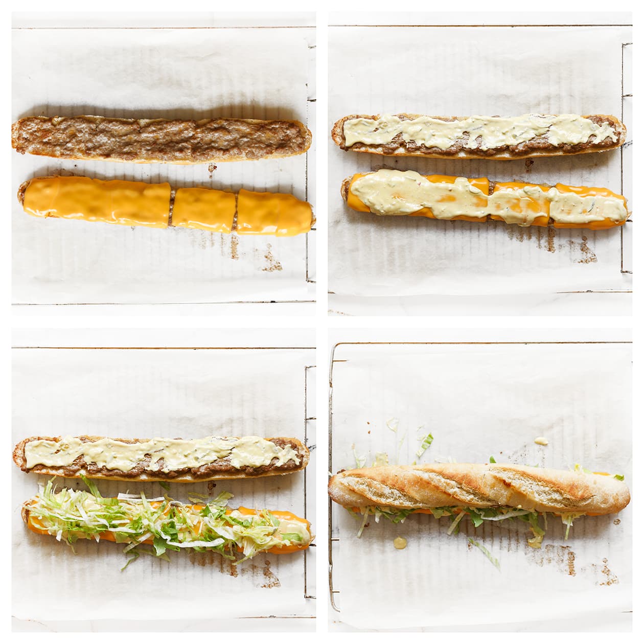 kaas, saus en sla verdelen over de baguette met gehakt