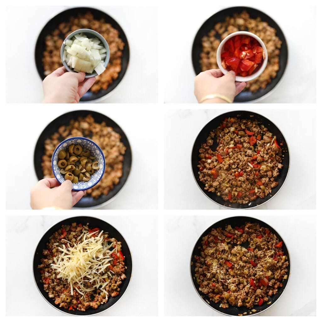 Voeg de fijngesneden gele ui, stukjes rode paprika en groene olijven toe. Bak nog 4-5 minuten, tot de groenten zacht zijn. Haal de pan van het vuur en roer de geraspte kaas erdoor. Meng alles goed door elkaar.