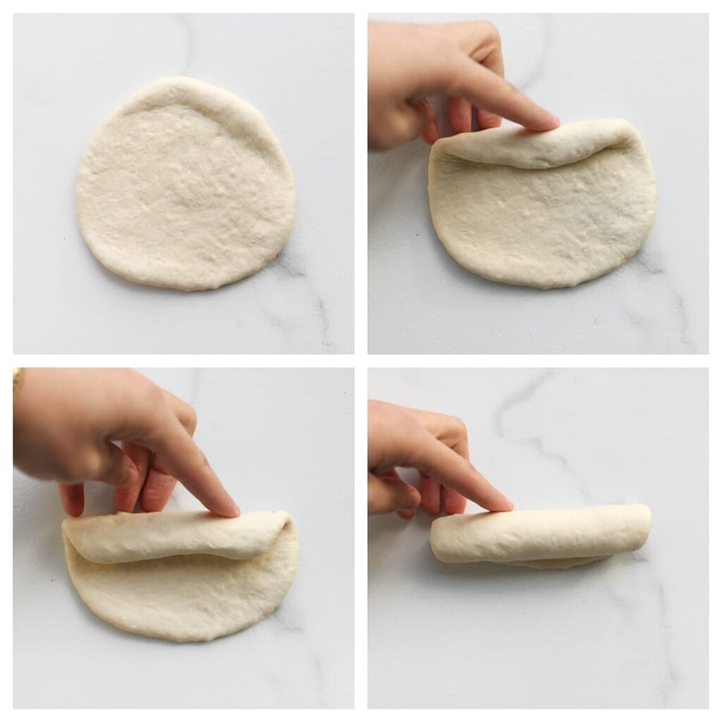 Vouw de bovenrand van het deeg een stukje naar beneden en druk licht aan. Rol het deeg verder op tot een stevige staaf.