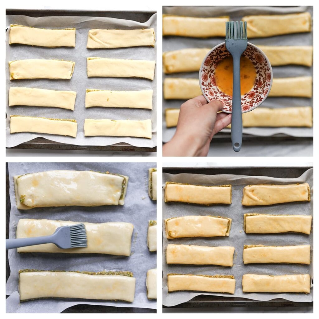 Leg de deegstukken op een met bakpapier beklede bakplaat. Bestrijk ze met het geklutste ei. Laat ze nogmaals 30 minuten rijzen op een warme plek, of tot ze in omvang zijn verdubbeld.