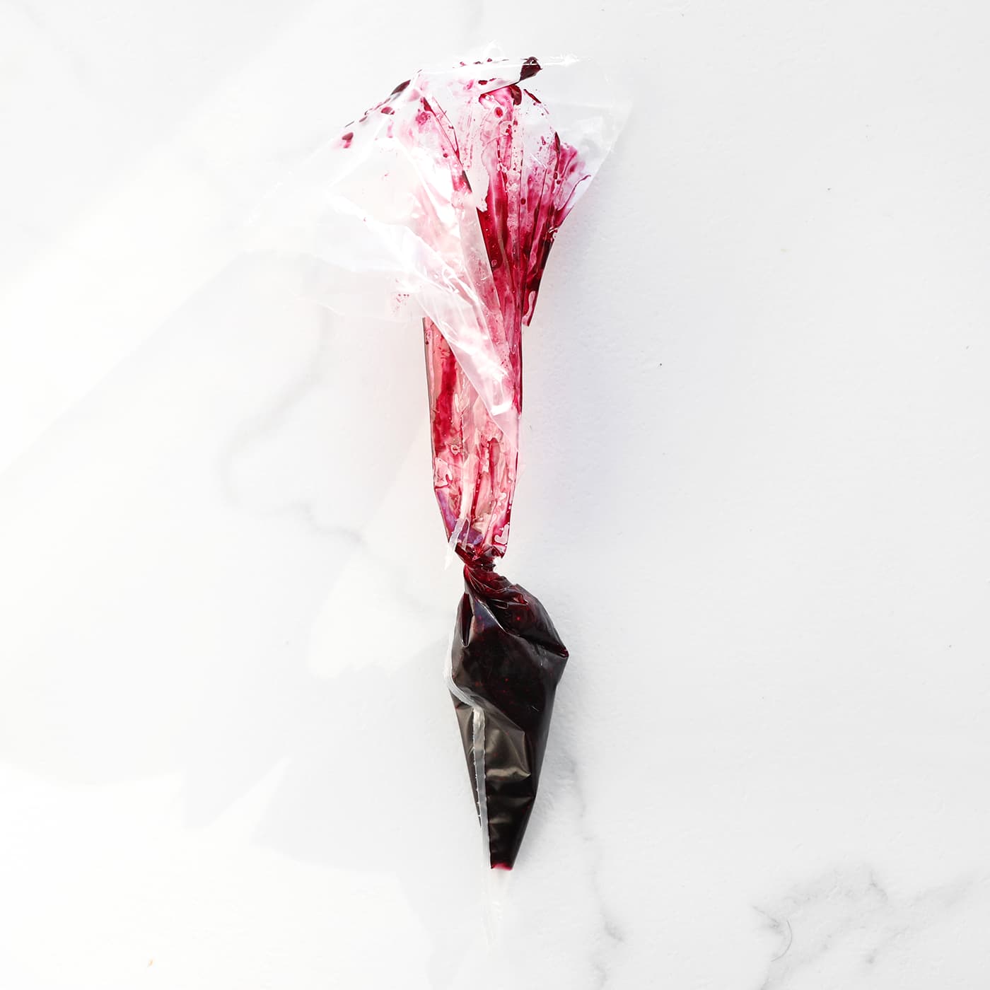 Bosbessensiroop in spuitzak