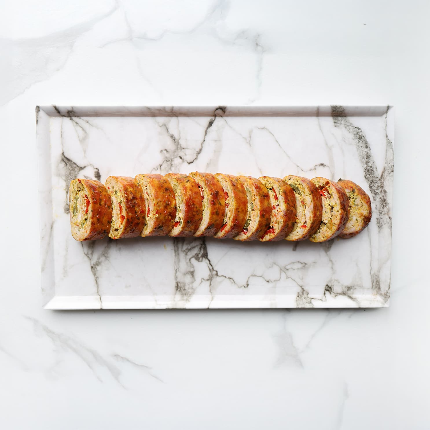 Kiprollade in stukken snijden