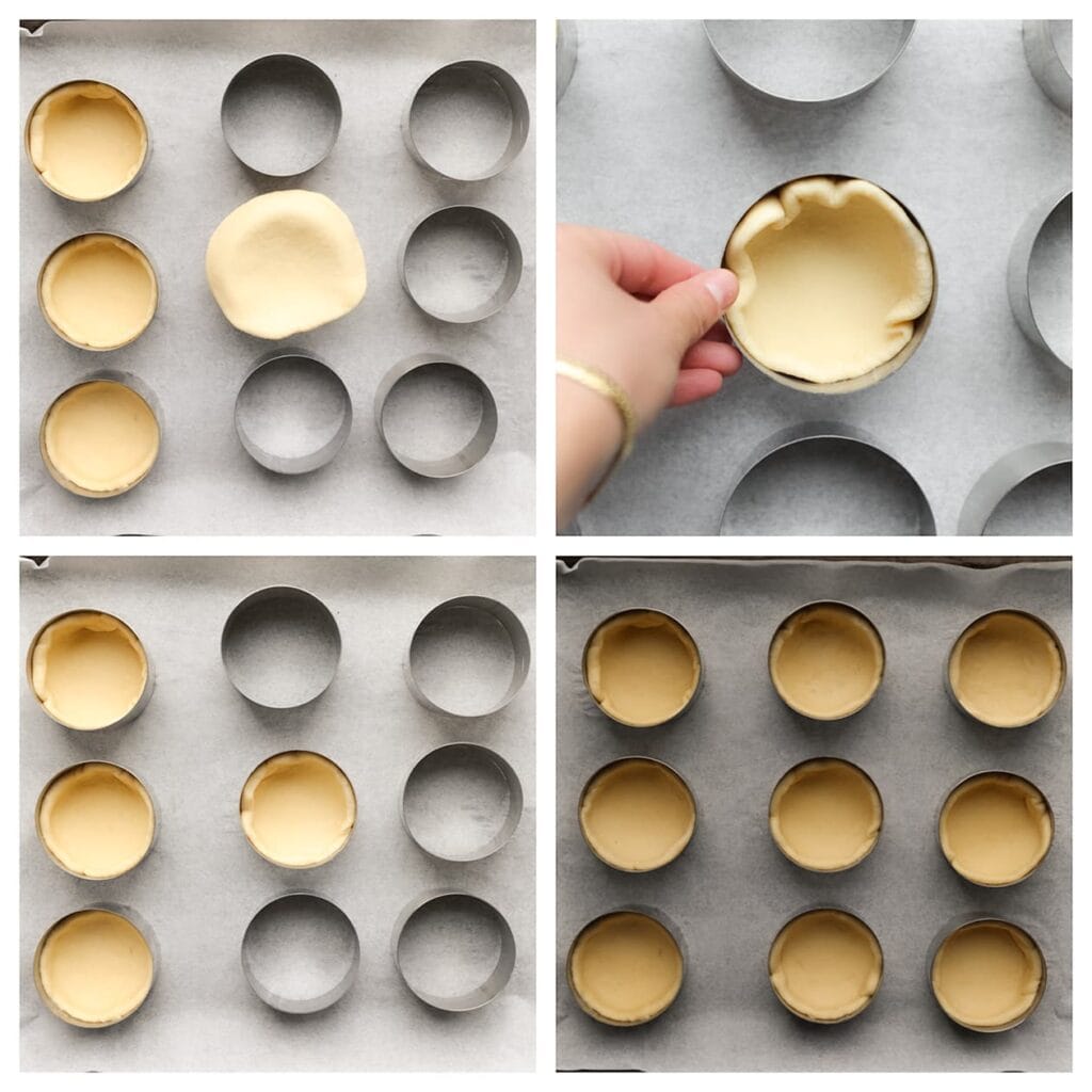 Leg bakringen op een bakplaat met bakpapier. Leg het deeg over de bakringen en druk ze aan zodat de binnenkant bedekt is.