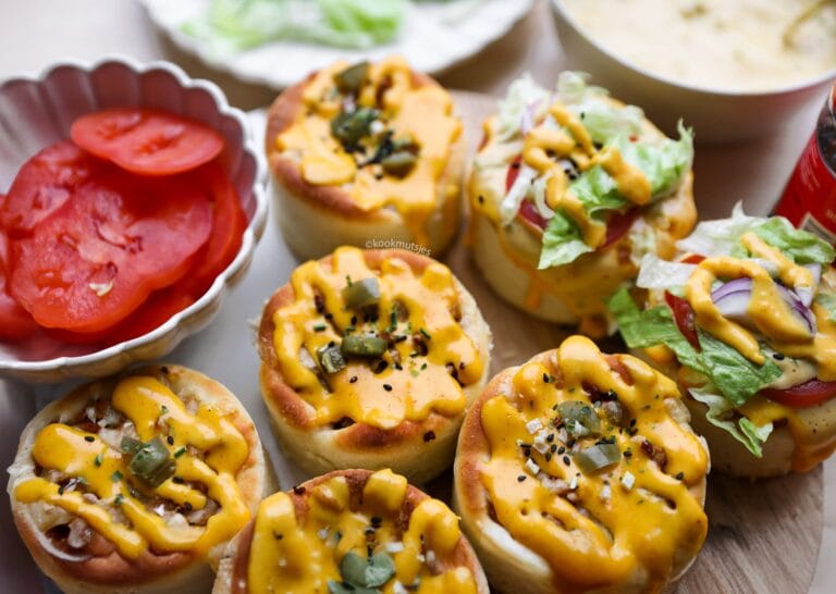 Soft Bread With Ground Meat And Cheese Sauce