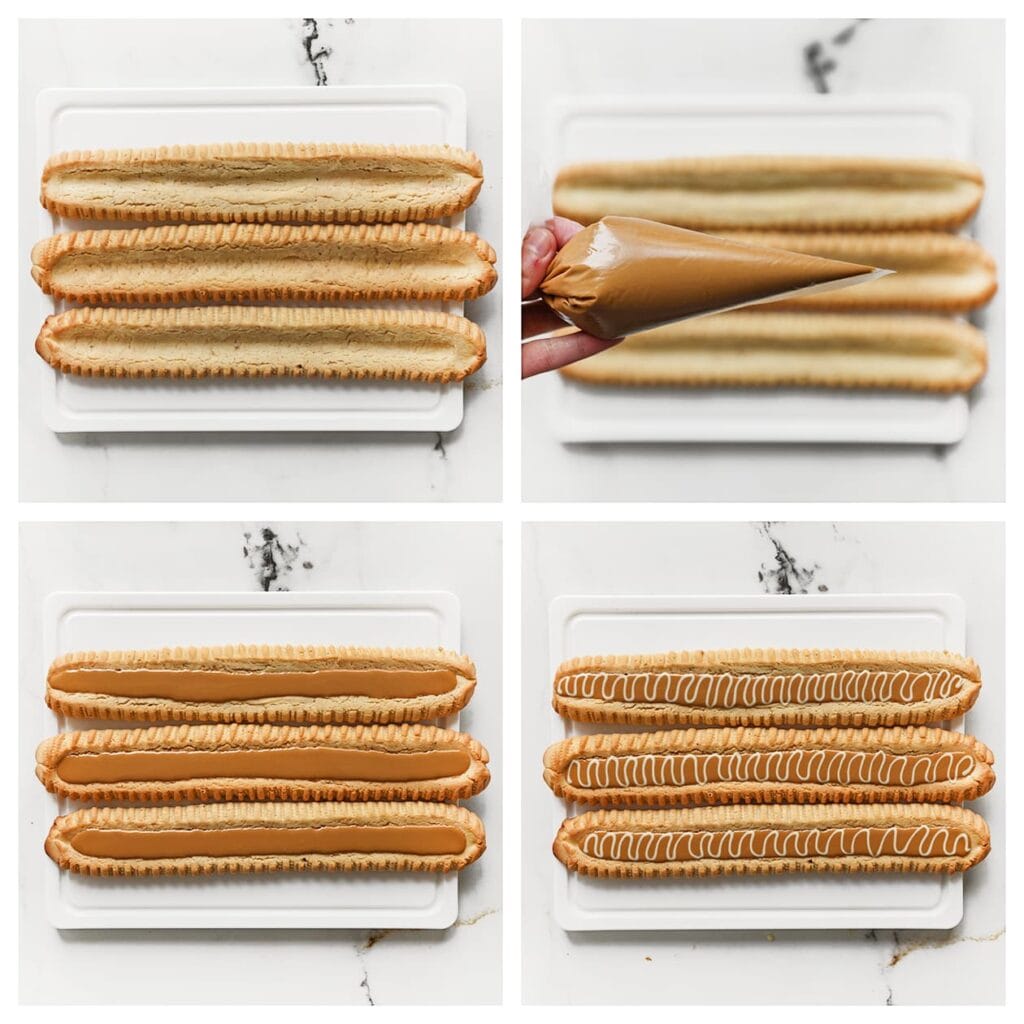 Vul de biscoff koekjes met het biscoff-chocolademengsel en spuit er, indien gewenst, witte chocolade overheen. Gebruik een tandenstoker om een sierlijk patroon te maken.