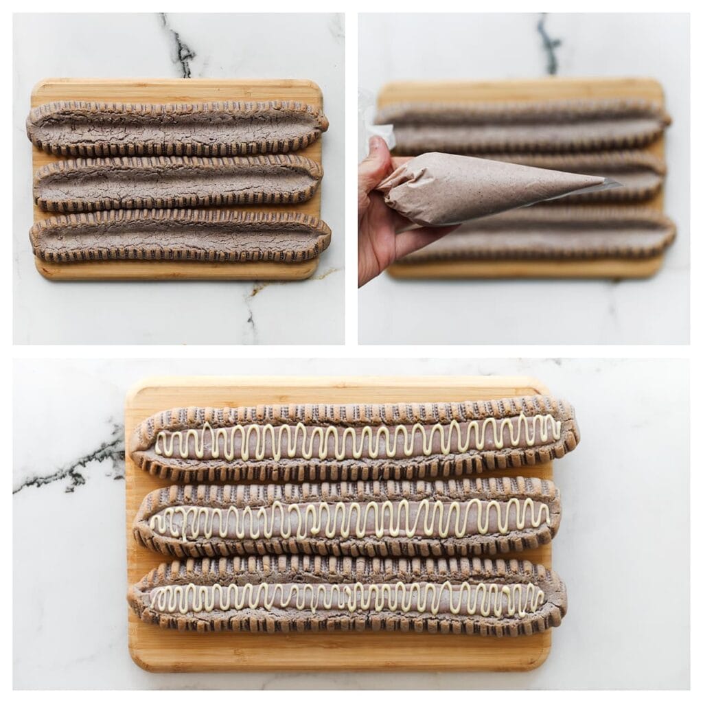 Vul de bosbessenkoekjes met de bosbessen-witte chocolade. Indien gewenst, kun je er nog extra witte chocolade overheen spuiten.