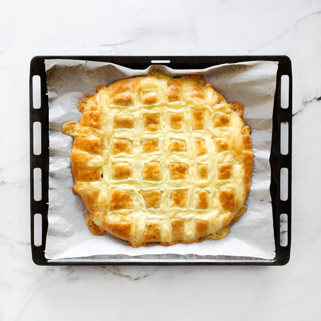 Bak het brood in een voorverwarmde oven op 200 °C in 12-18 minuten goudbruin.
