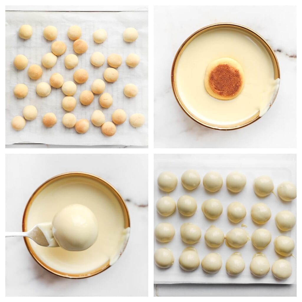  Doop de koekjes in de gesmolten chocolade en leg ze terug op bakpapier.