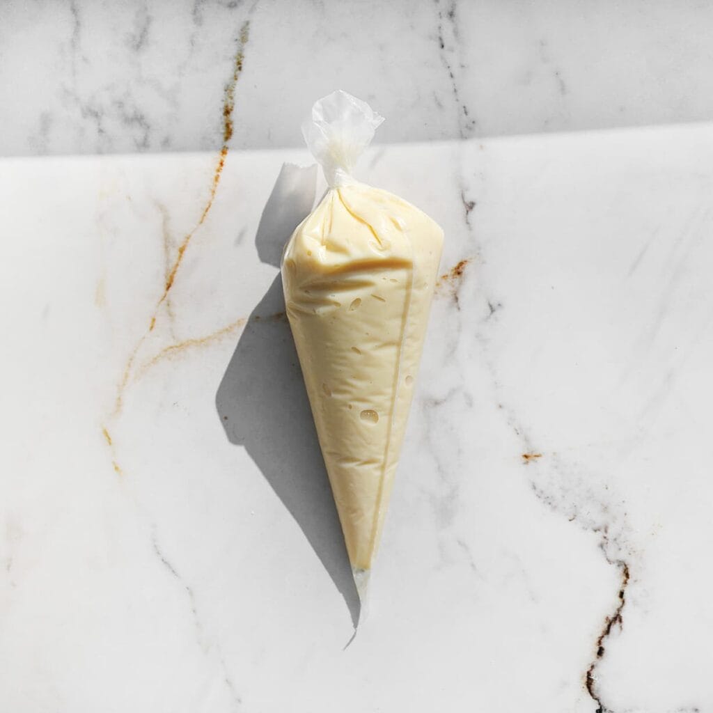 Doe de vulling in een spuitzak. 